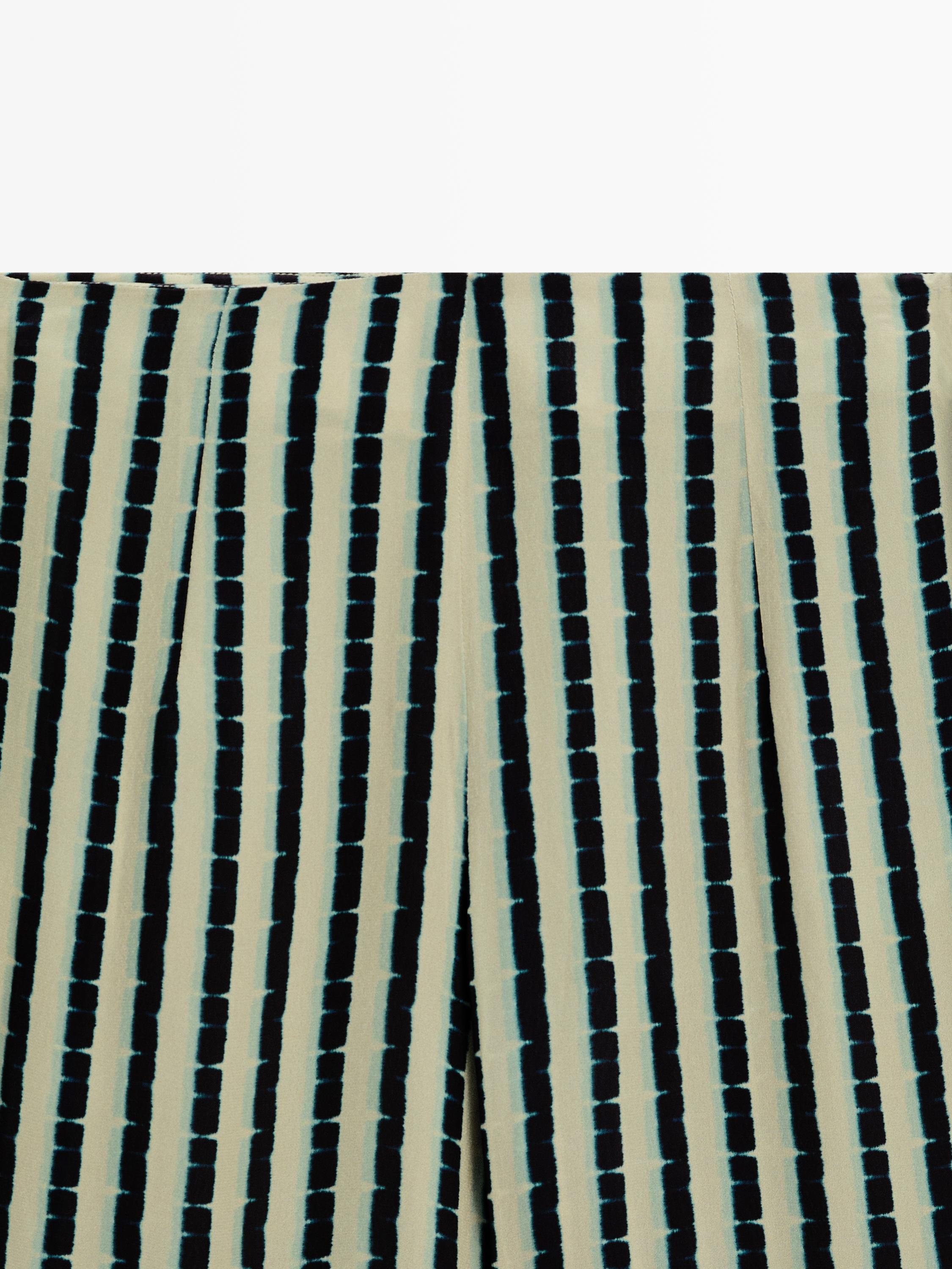 Striped flare fit trousers